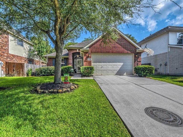 Photo 1 of 22 - 21808 Grand Lancelot Dr, Kingwood, TX 77339
