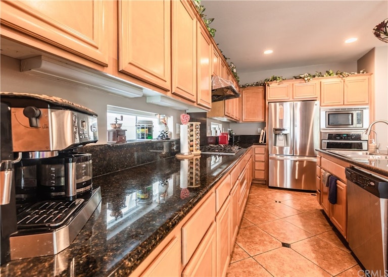 Photo 16 of 48 - 7931 Barnstormer Ct, Chino, CA 91708