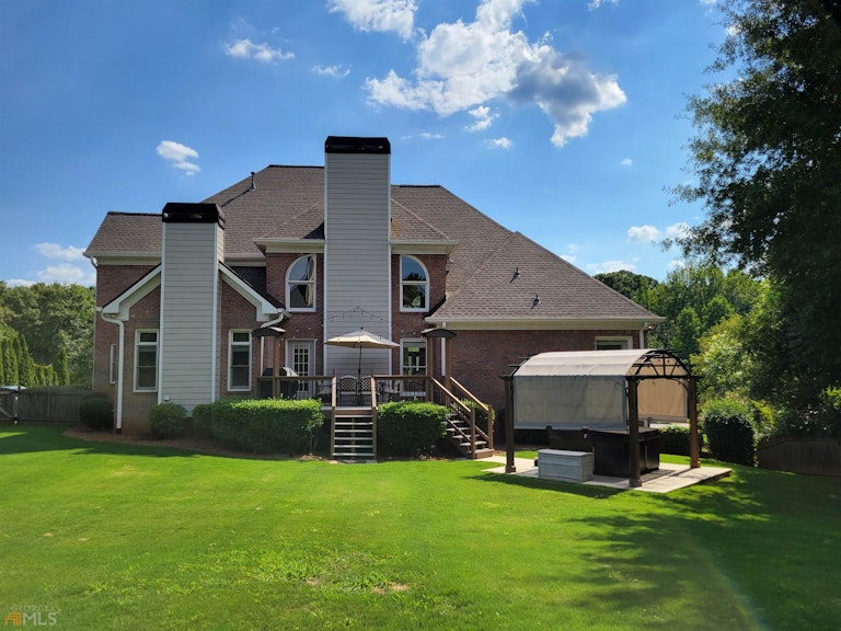 Photo 3 of 19 - 7470 Northampton Ct, Cumming, GA 30040