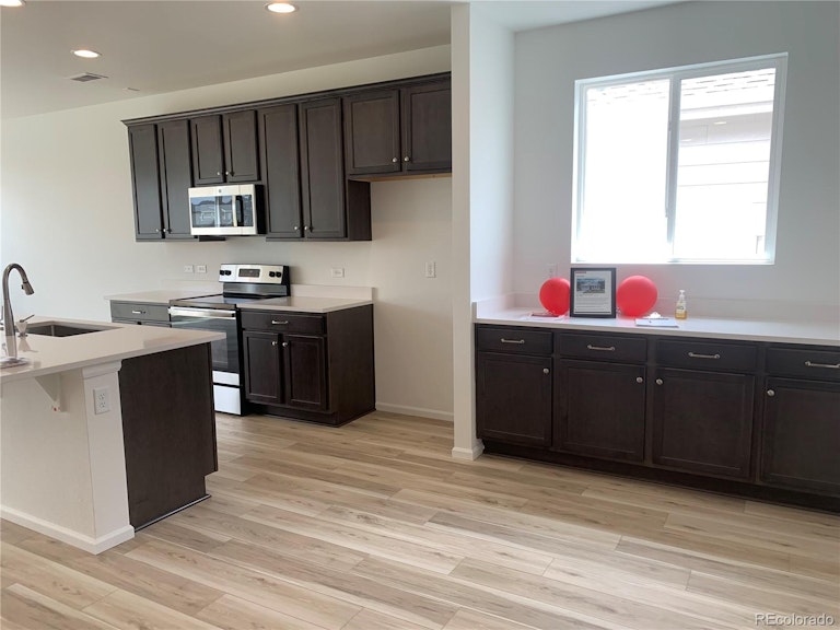 Photo 3 of 13 - 27656 E 10th Dr, Aurora, CO 80018