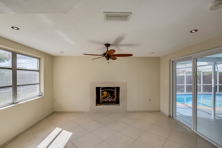 Photo 6 of 14 - 9605 Rainbow Ln, Port Richey, FL 34668