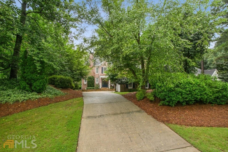 Photo 2 of 39 - 3415 Woodbury Creek Dr, Cumming, GA 30041