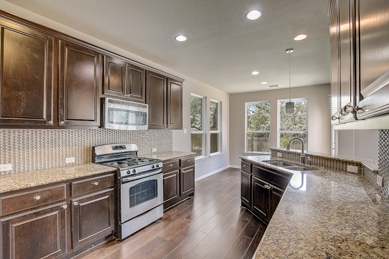Photo 29 of 50 - 1613 Rimstone Dr, Cedar Park, TX 78613