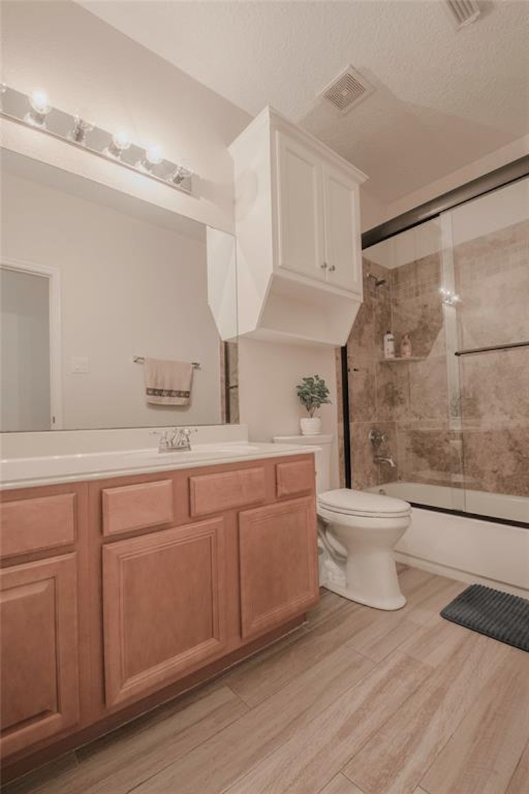 Photo 15 of 25 - 6606 Autumn Sunset Ln, Spring, TX 77379