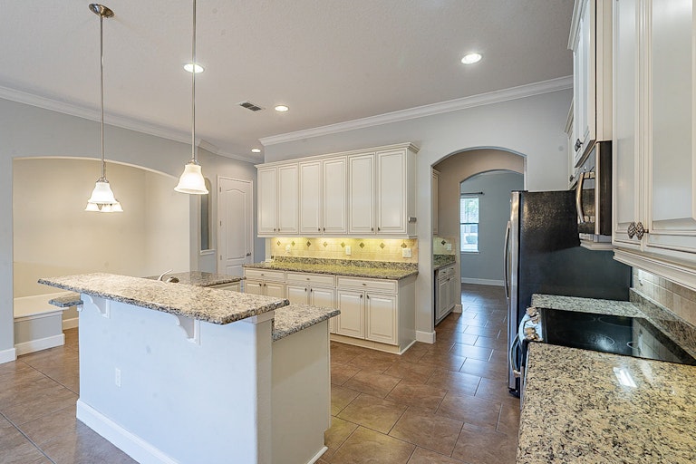 Photo 9 of 28 - 10611 Village Lake Rd, Windermere, FL 34786