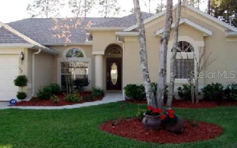 Photo 1 of 1 - 157 Boulder Rock Dr, Palm Coast, FL 32137