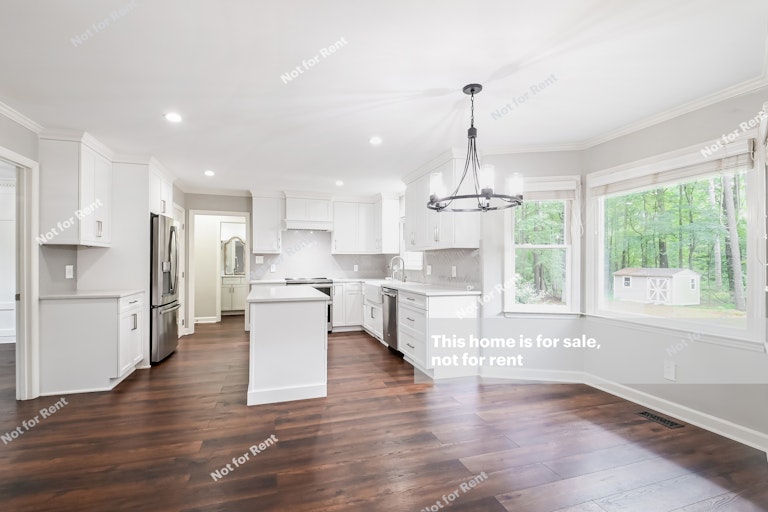 Photo 13 of 26 - 4908 Ten Ten Rd, Apex, NC 27539