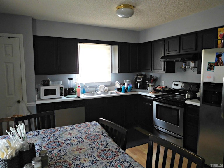 Photo 4 of 19 - 5408 Trenburg Ct, Knightdale, NC 27545