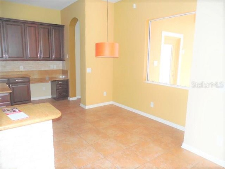Photo 7 of 25 - 8748 Handel Loop, Land O Lakes, FL 34637