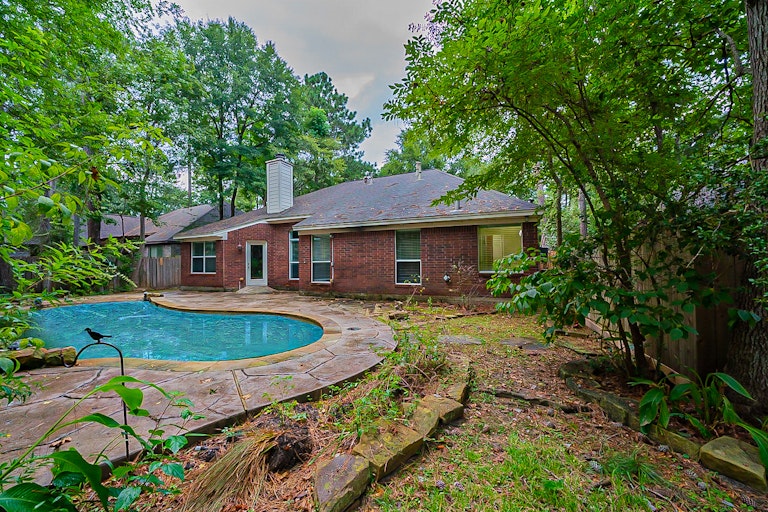 Photo 33 of 39 - 57 N Old Cedar Cir, Spring, TX 77382