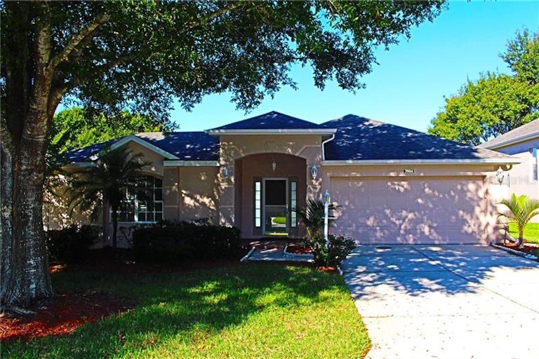 Photo 1 of 19 - 3904 Allamanda Ct, Clermont, FL 34711