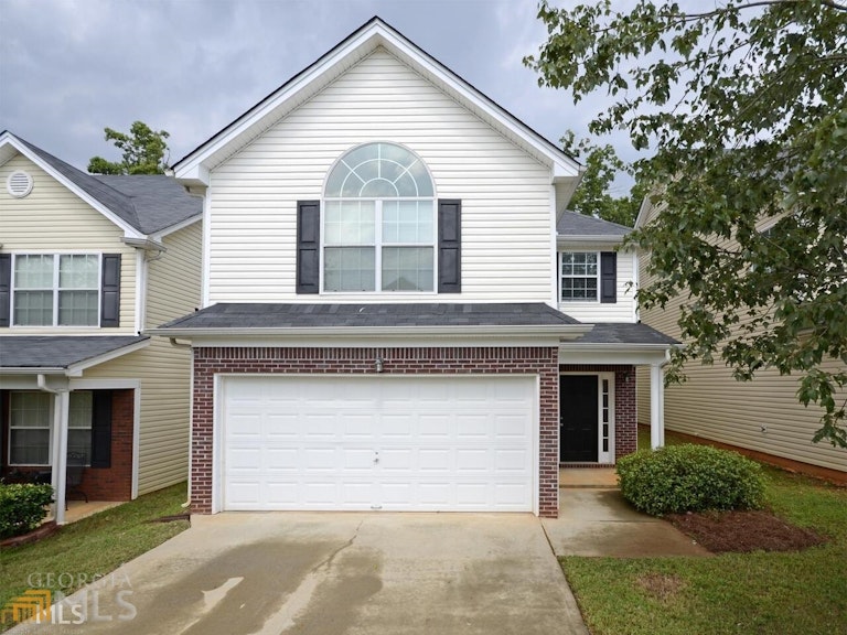 Photo 1 of 24 - 11144 James Madison Dr, Hampton, GA 30228