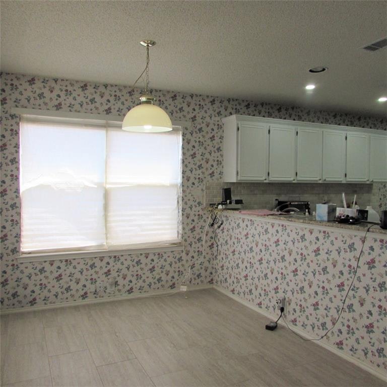 Photo 14 of 32 - 1345 Mill Wood Ln, Garland, TX 75040