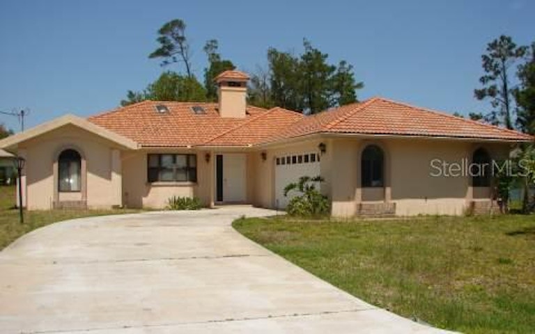 Photo 1 of 1 - 102 Forest Hill Dr, Palm Coast, FL 32137