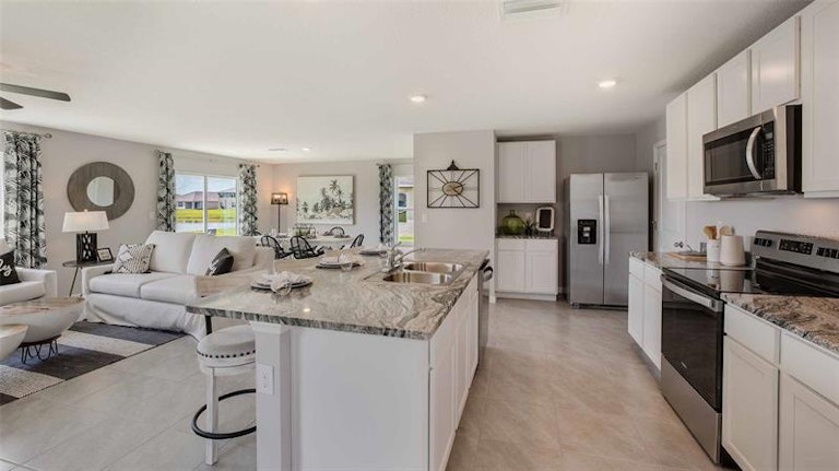 Photo 3 of 17 - 12216 Mountain Island Trl, Parrish, FL 34219