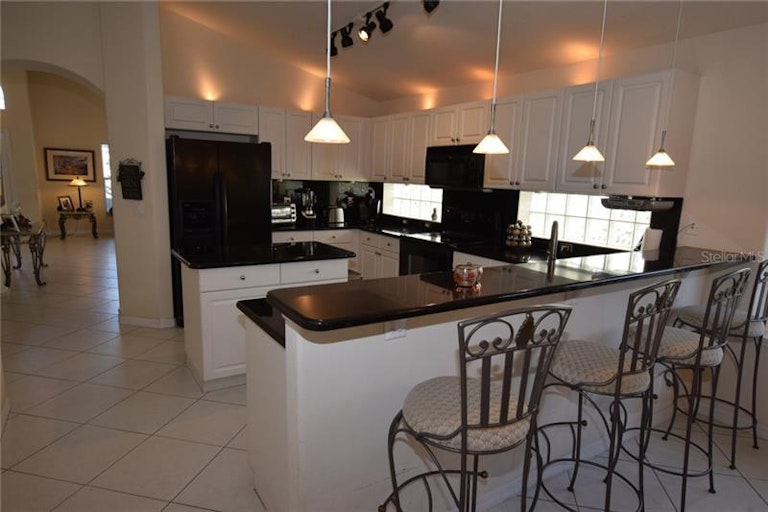 Photo 9 of 25 - 13908 Budworth Cir, Orlando, FL 32832