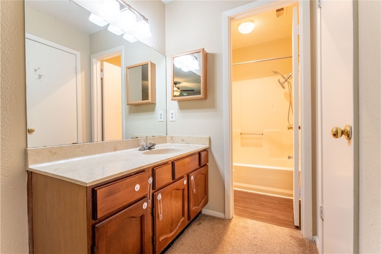 Photo 12 of 32 - 9000 Mountain Ridge Dr, Austin, TX 78759