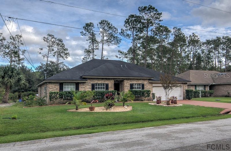 Photo 29 of 35 - 72 Red Mill Dr, Palm Coast, FL 32164