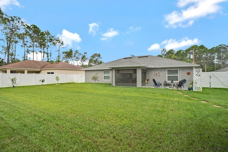 Photo 40 of 40 - 39 Rickenbacker Dr, Palm Coast, FL 32164