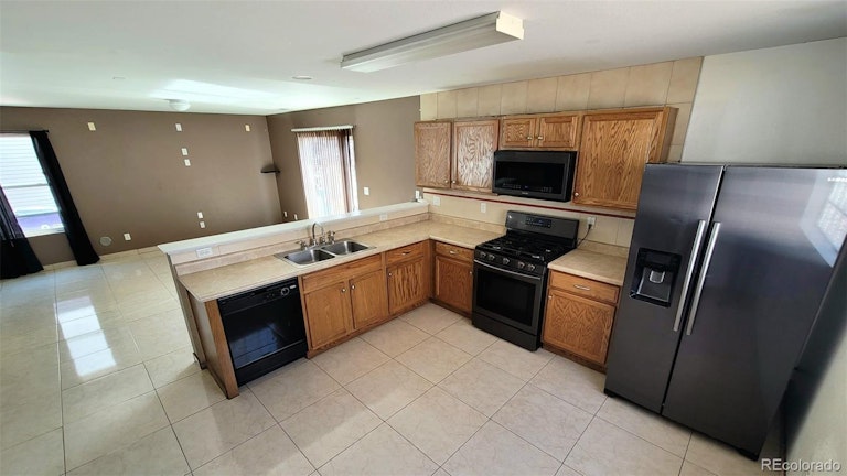 Photo 4 of 20 - 5563 Halifax St, Denver, CO 80249