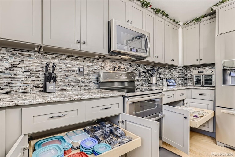 Photo 9 of 31 - 9281 W Indore Dr, Littleton, CO 80128
