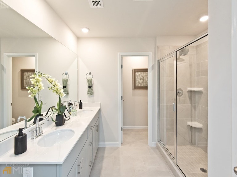 Photo 12 of 18 - 869 Sara Meadow Rd, Loganville, GA 30052