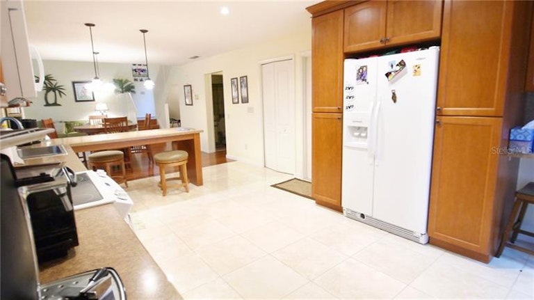 Photo 9 of 25 - 6470 Edgeworth Dr, Orlando, FL 32819