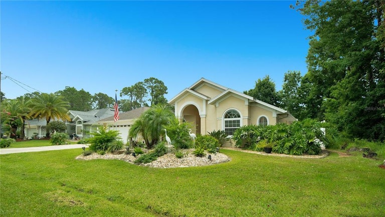Photo 2 of 37 - 86 Wood Haven Dr, Palm Coast, FL 32164