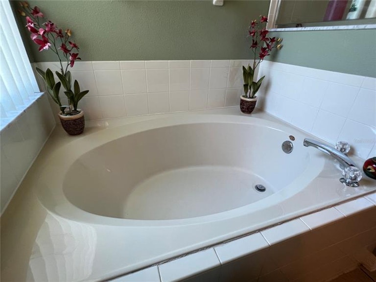 Photo 32 of 59 - 1028 Grand Reserve Dr, Davenport, FL 33837