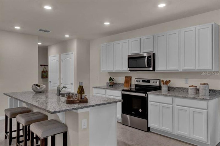 Photo 9 of 32 - 2932 Sunridge Loop, Saint Cloud, FL 34771