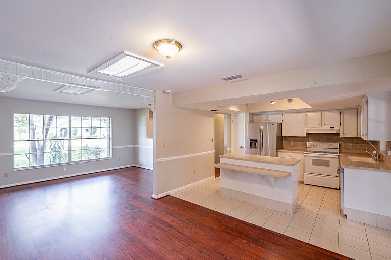 Photo 12 of 26 - 879 Fruitland Dr, Deltona, FL 32725
