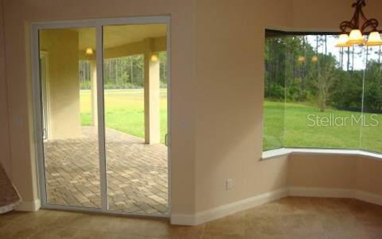 Photo 15 of 24 - 102 S Coopers Hawk Way, Palm Coast, FL 32164