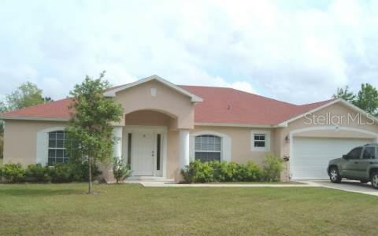 Photo 1 of 1 - 38 Persimmon Dr, Palm Coast, FL 32164