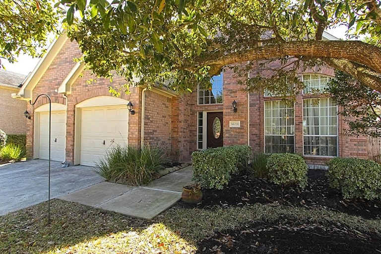 Photo 1 of 22 - 16211 Halpren Falls Ln, Cypress, TX 77429