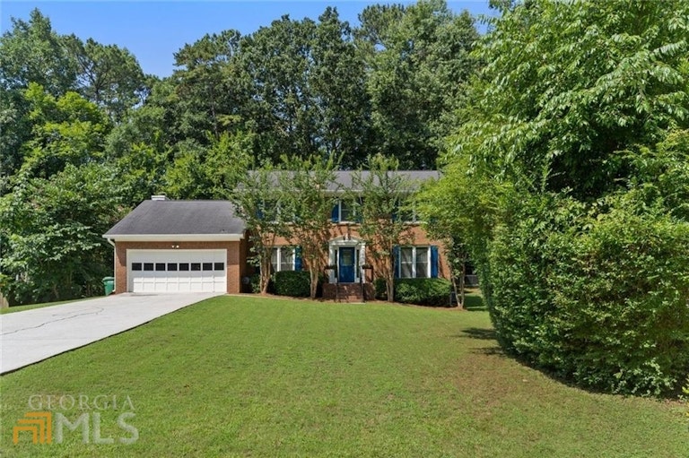 Photo 2 of 42 - 4658 Robie Rd SW, Lilburn, GA 30047