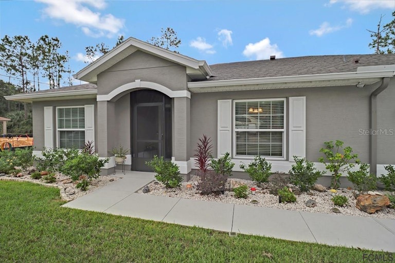 Photo 1 of 40 - 39 Rickenbacker Dr, Palm Coast, FL 32164