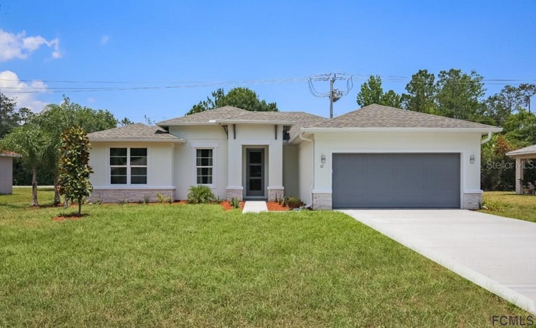 Photo 2 of 24 - 52 Robinson Dr, Palm Coast, FL 32164