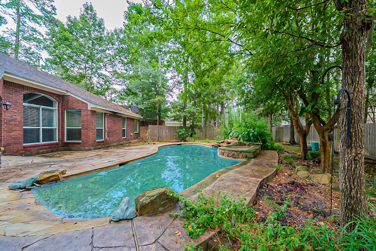 Photo 35 of 39 - 57 N Old Cedar Cir, Spring, TX 77382
