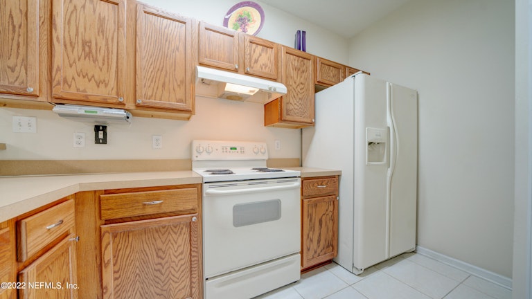Photo 12 of 26 - 12329 Mangrove Forest Ct, Jacksonville, FL 32218