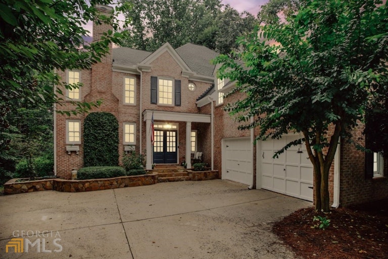 Photo 1 of 39 - 3415 Woodbury Creek Dr, Cumming, GA 30041