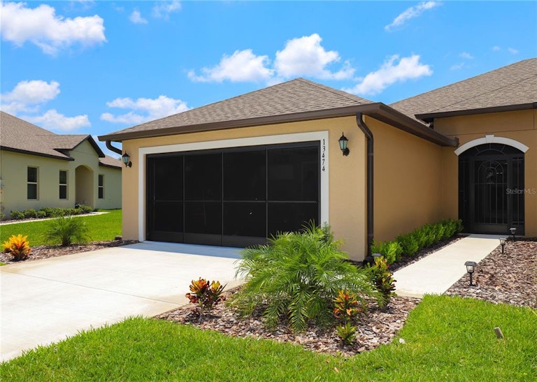 Photo 2 of 58 - 13474 Crest Lake Dr, Hudson, FL 34669