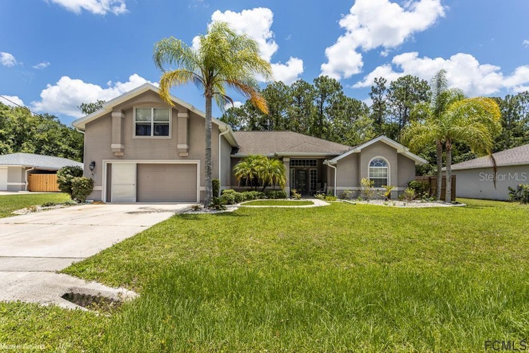 Photo 1 of 29 - 47 Kashmir Trl, Palm Coast, FL 32164