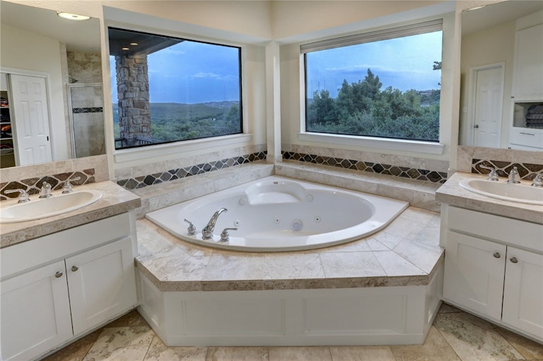 Photo 23 of 40 - 6301 Mountainclimb Dr, Austin, TX 78731
