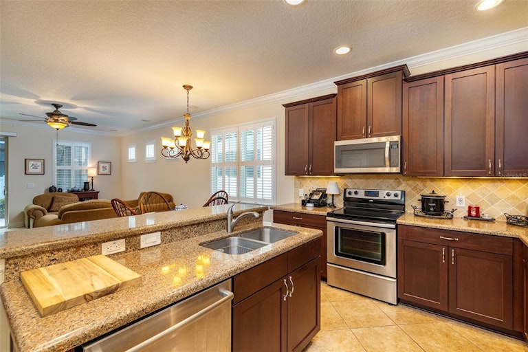 Photo 8 of 40 - 7709 S Fitzgerald St, Tampa, FL 33616