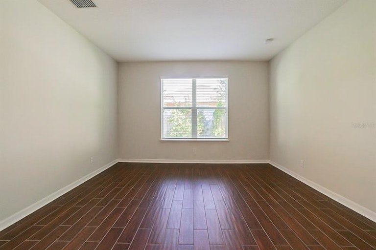 Photo 11 of 24 - 32601 Harmony Oaks Dr, Wesley Chapel, FL 33545