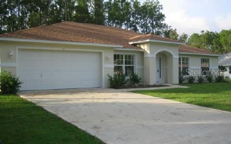 Photo 1 of 1 - 31 Poinsettia Ln, Palm Coast, FL 32164