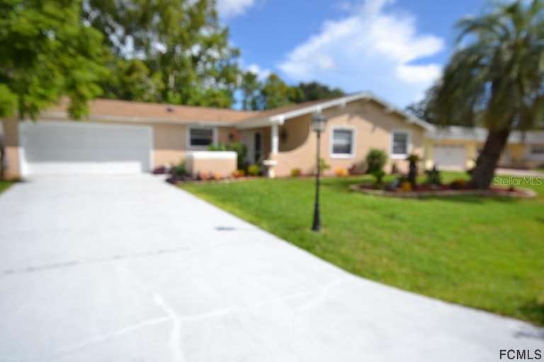 Photo 1 of 22 - 59 Farragut Dr, Palm Coast, FL 32137