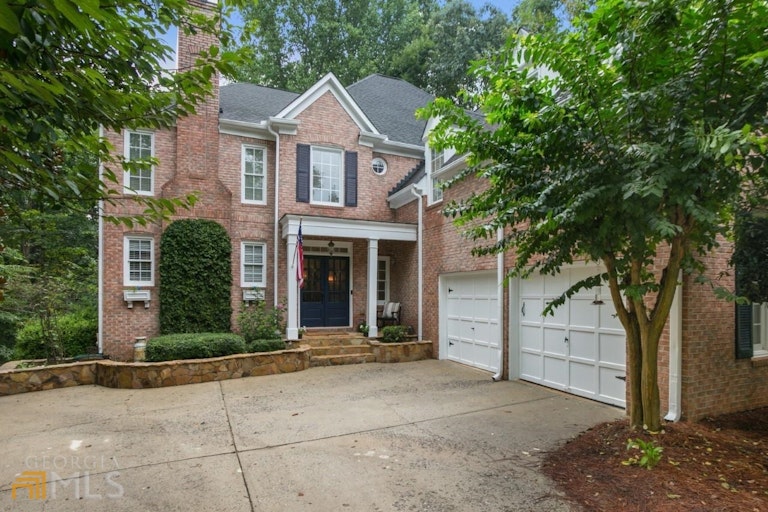 Photo 3 of 39 - 3415 Woodbury Creek Dr, Cumming, GA 30041