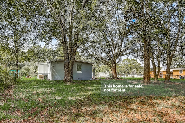 Photo 7 of 29 - 4030 Lockhart Dr N, Jacksonville, FL 32209
