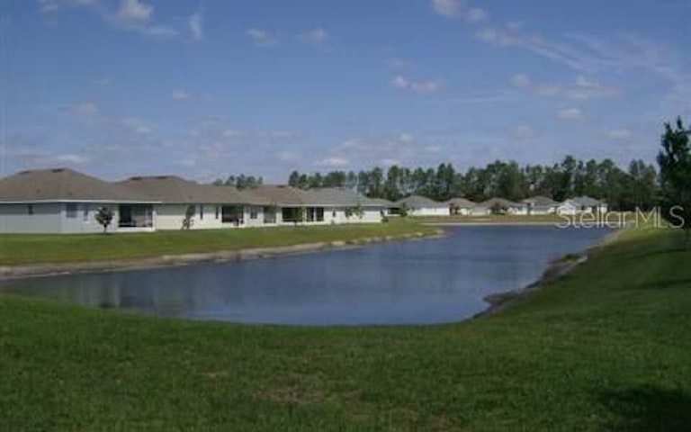 Photo 4 of 5 - 163 Raintree Cir, Palm Coast, FL 32164